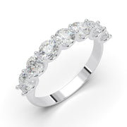 a white gold ring with five stones